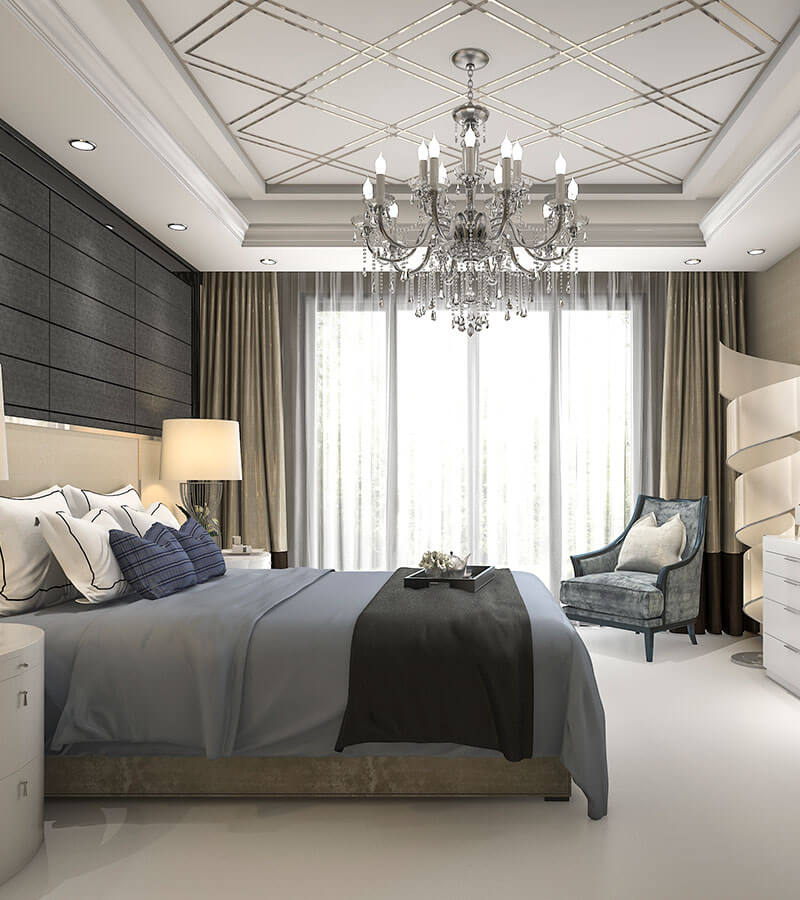 Remodeled bedroom with smooth drywall finish and natural lighting