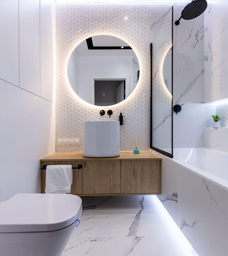 Renovated bathroom with modern tile work and clean fixture installation